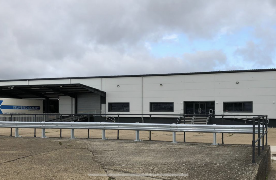 REFURBISHMENT Overclad existing front elevation with Kingspan KS1000