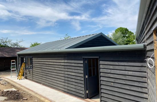 Barn Conversion - Kingspan Trapezoidal secret fix DRComposite roofing panels in colour Melin Grey XL Forte